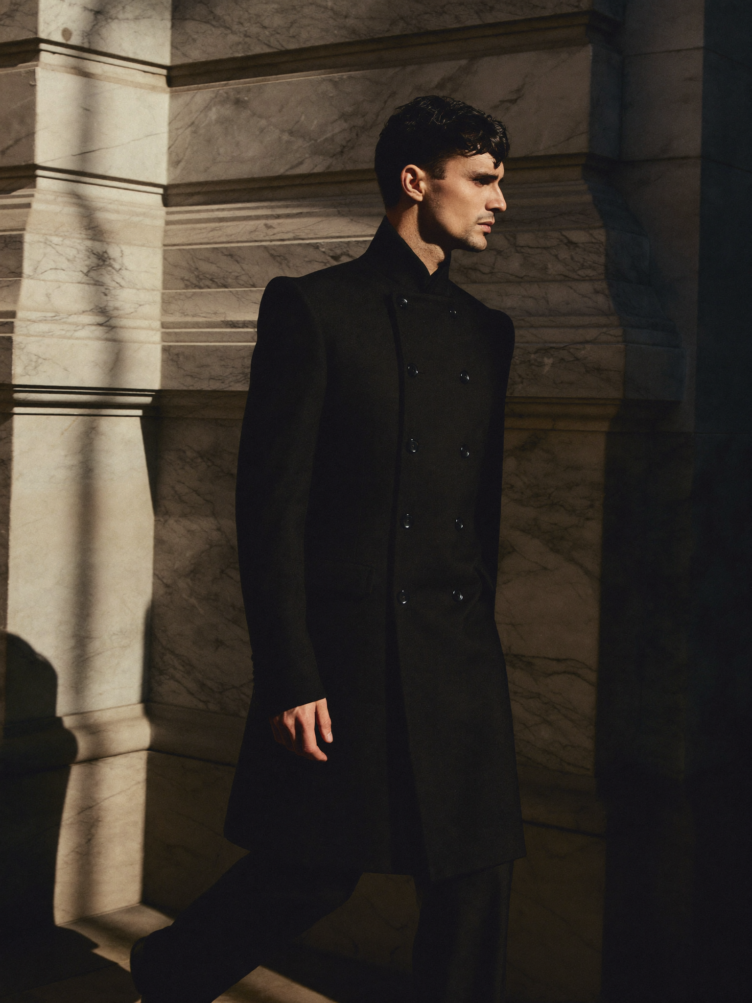Orvane Double-Breasted Wool Coat in Black — editorial